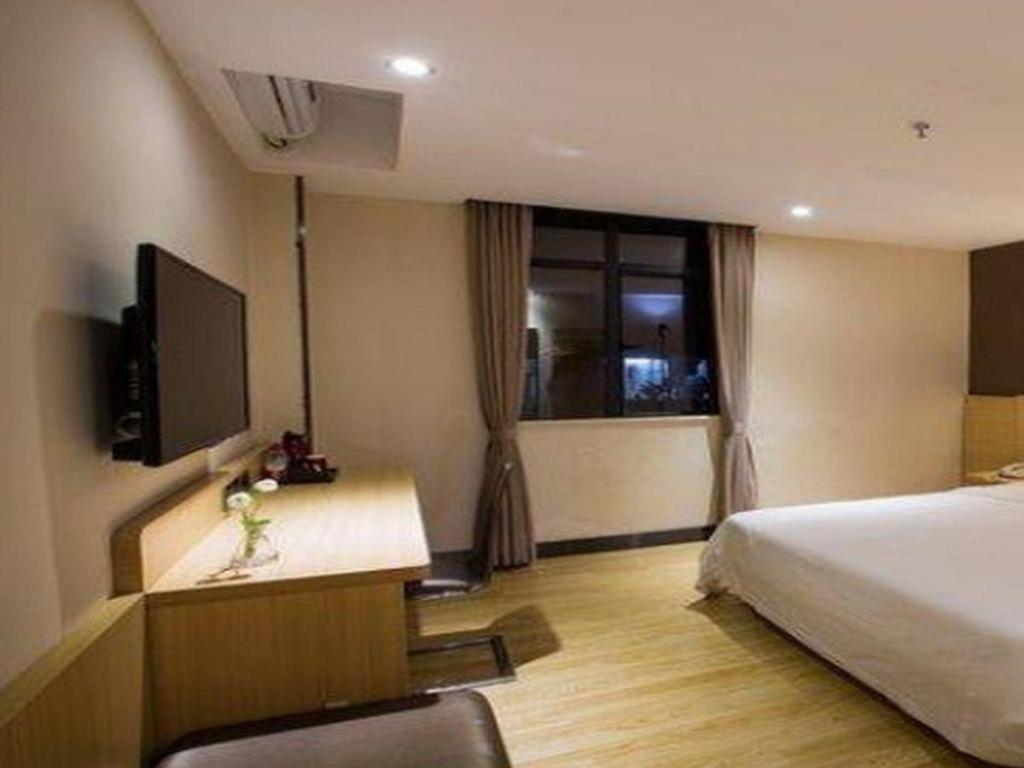 7 เดย์ส พรีเมี่ยม จางเยอ บัส สเตชั่น บรานช์ Hotel จางเย่ ภายนอก รูปภาพ